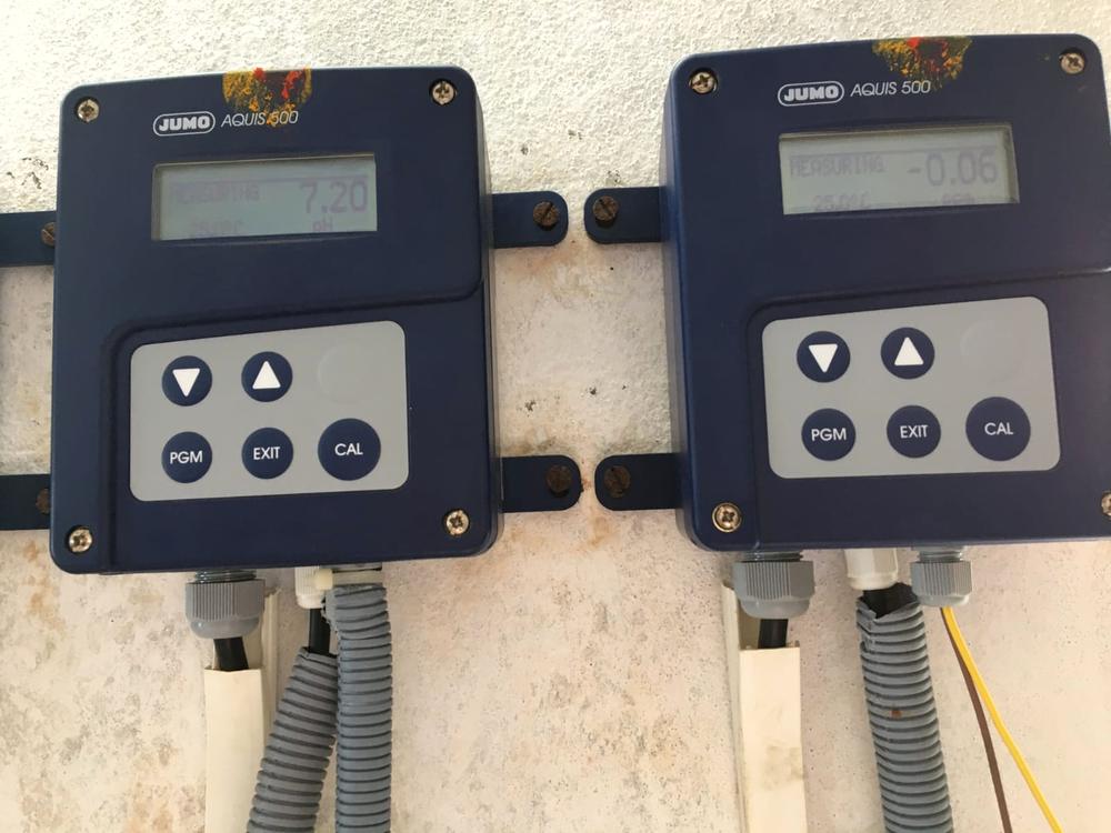 pH and chlorine analyzers reading live on the treatment line